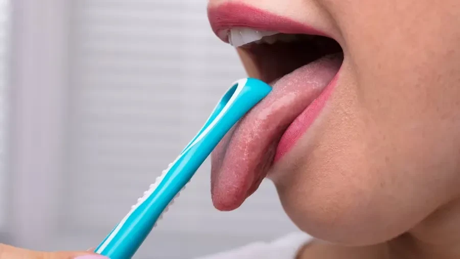 Closeup Toothbrush With Tongue Cleaner